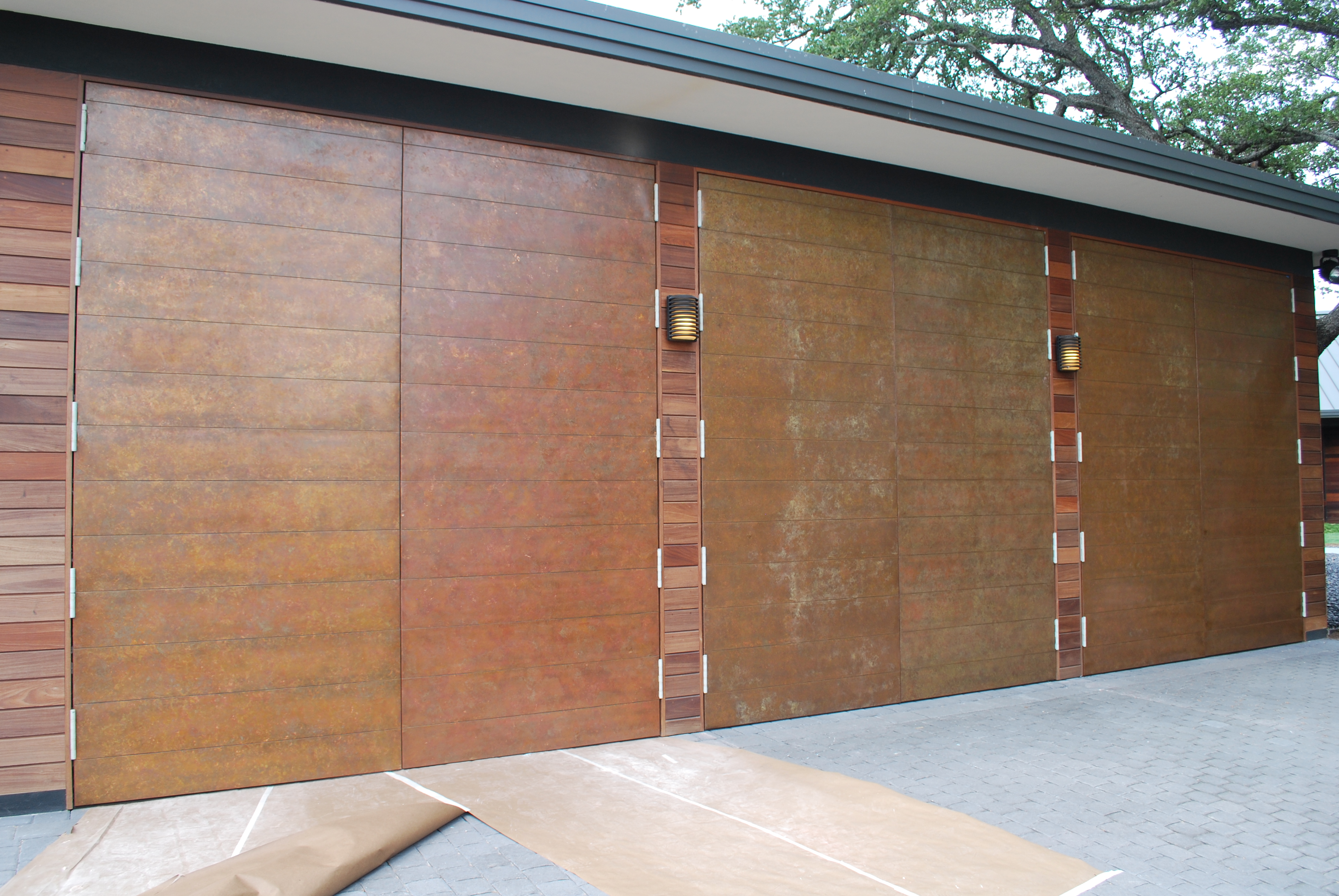 Joshua-Tillery-DD-copper-clad-swing-doors-with-individual-panels-to-match-siding-2