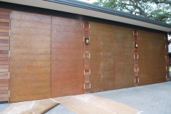 Joshua-Tillery-DD-copper-clad-swing-doors-with-individual-panels-to-match-siding-2