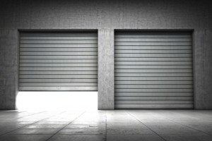 Two men injured when garage door falls onto them